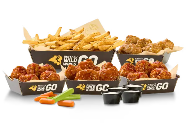 Buffalo Wild Wings 20 boneless wings with fries celery carrots and dipping sauces meal.