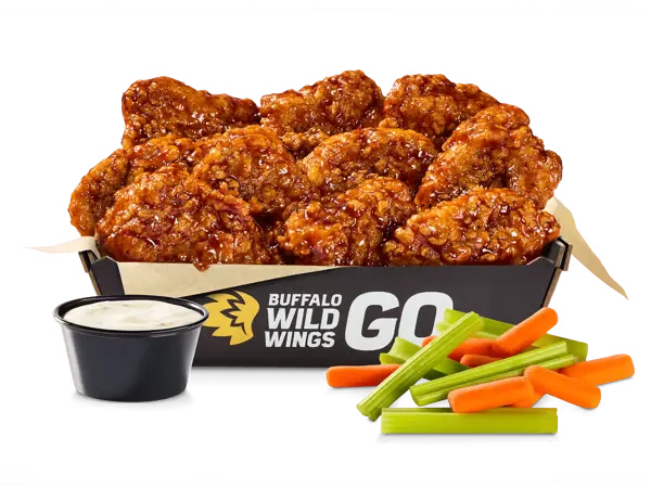 Buffalo Wild Wings boneless chicken wings with ranch dipping sauce celery and carrots.