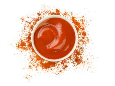 Hot sauce with deep red color and strong spicy heat
