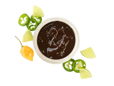 Caribbean jerk sauce with rich brown color and island spices