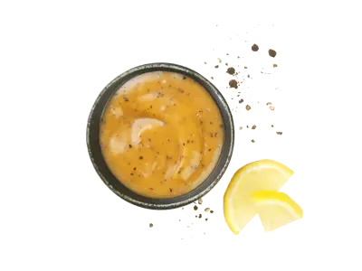 Lemon pepper sauce with creamy texture and tangy citrus seasoning