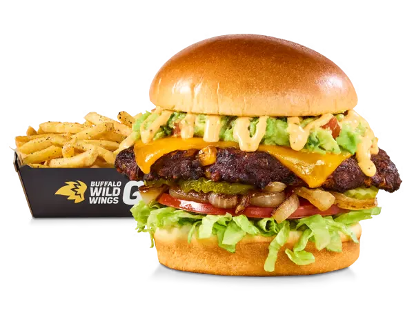 Black bean veggie burger with lettuce, cheese, and southwestern-style toppings, served with fries