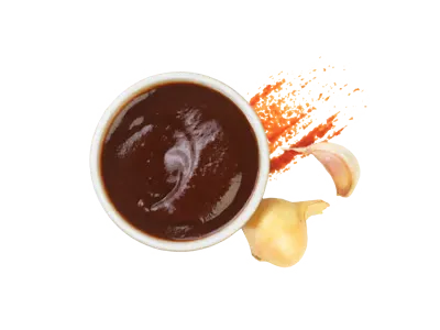 Sweet BBQ sauce with thick dark glaze and smoky sweetness